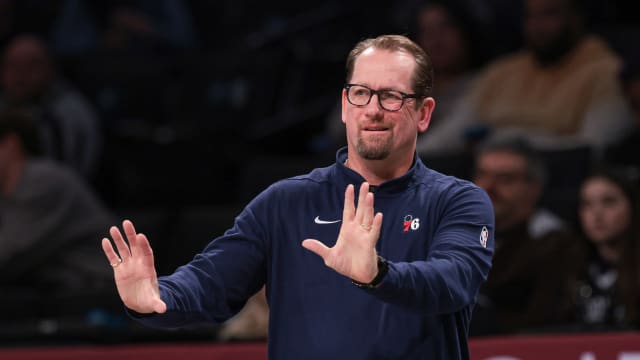 Philadelphia 76ers head coach Nick Nurse reacts during an NBA game.